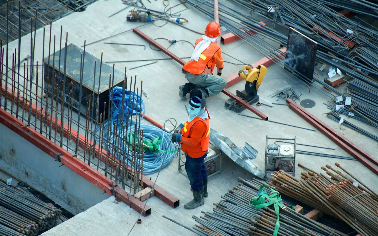 Crew tying rebar on a commercial construction deck