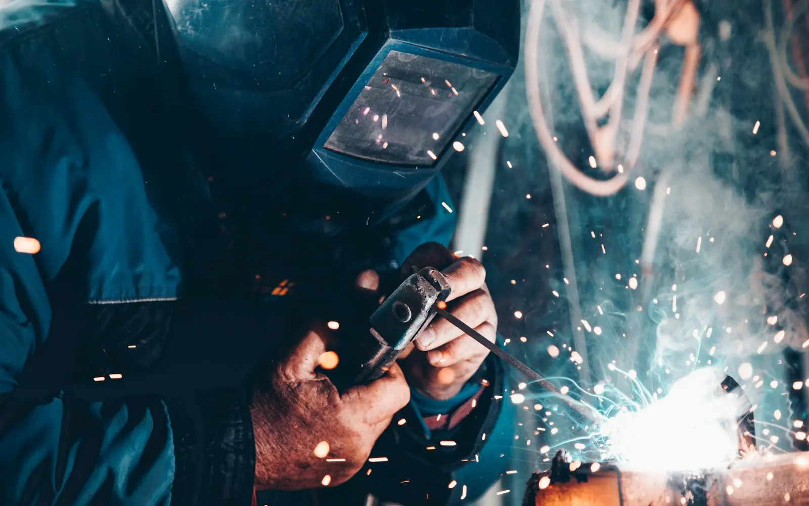 Welder at work in a fabrication shop